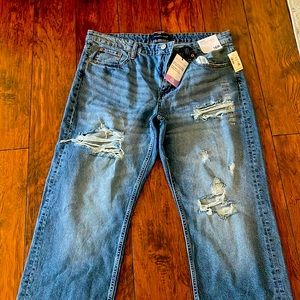 Distressed boot cut new with tags . Regular length